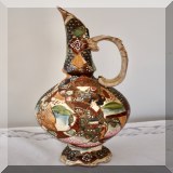 P19. Nippon handpainted moriage style ewer with handle. Some chips on bottom. 13” - $75 